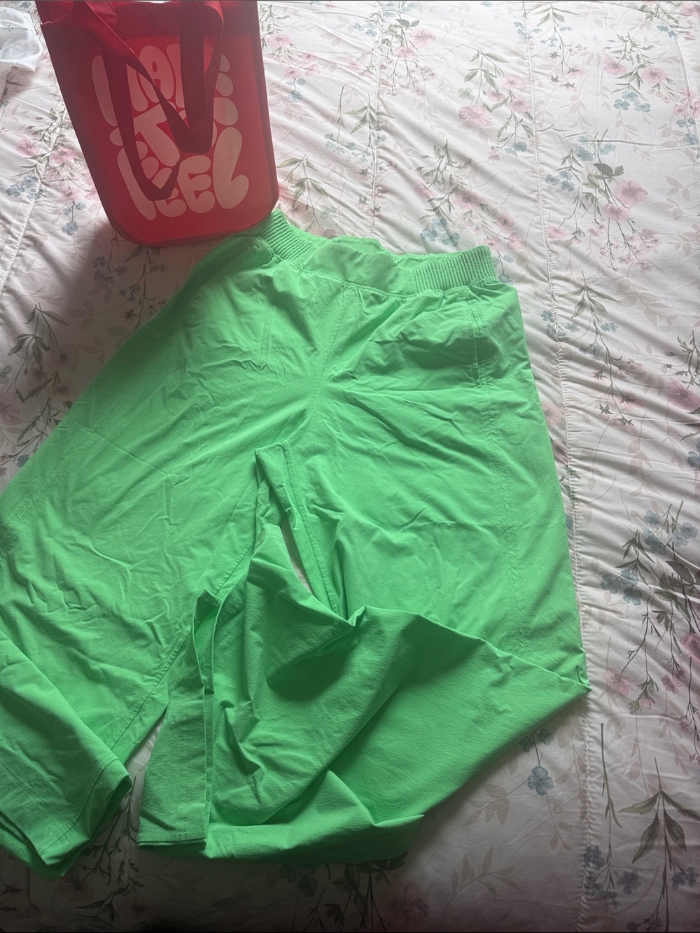 Lululemon Neon Green Lightweight Athletic Pants size M pockets and small slit